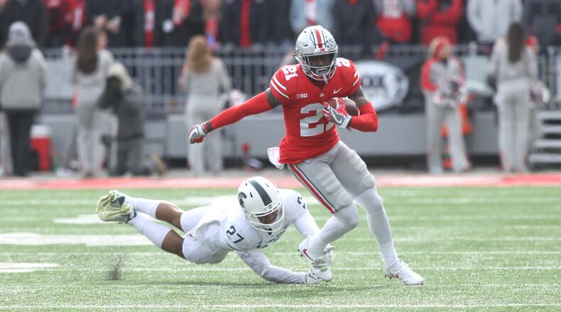 Ohio States Parris Campbell runs after a catch against Michigan State on Saturday, Nov. 11, 2017, at Ohio Stadium in Columbus. David Jablonski/Staff