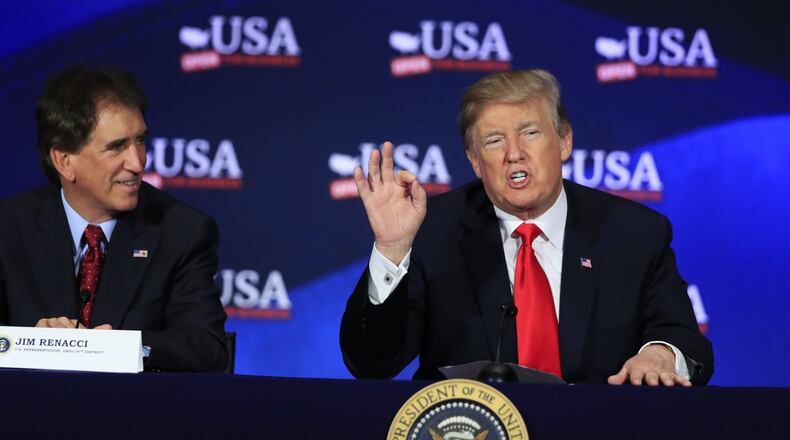President Donald Trump speaks during a roundtable discussion on tax reform at the Cleveland Public Auditorium and Conference Center in Cleveland, Ohio, Saturday, May 5, 2018. At right is Rep. Jim Renacci, R-Ohio. (AP Photo/Manuel Balce Ceneta)