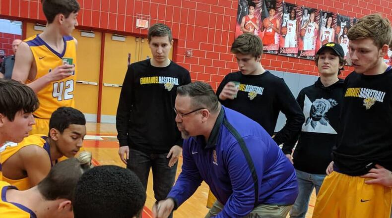 Lions coach Dan Moore makes a point. Springfield Emmanuel Christian defeated Tri-Village 61-48 to win a D-IV boys high school basketball sectional final at Troy on March 2, 2018. CONTRIBUTED PHOTO