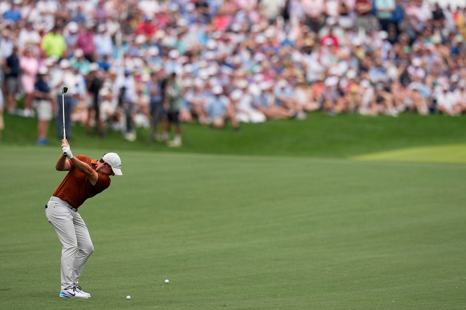 Rory McIlroy, of Northern Ireland, hits from the fairway on the second hole during the second round of the PGA Championship golf tournament at the Quail Hollow Club, Friday, May 16, 2025, in Charlotte, N.C. (AP Photo/David J. Phillip)