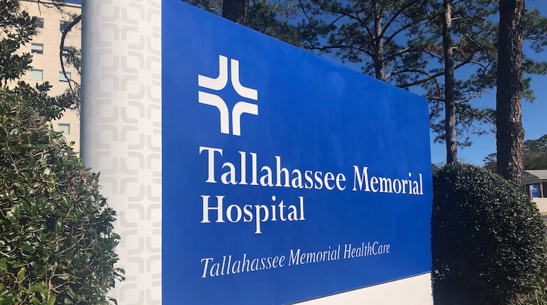 FILE - A sign is seen outside Tallahassee Memorial Hospital on Feb. 3, 2023, in Tallahassee, Fla. (AP Photo/Anthony Izaguirre, File)