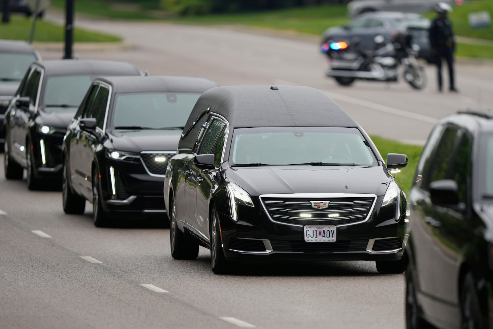 A funeral procession leaves Congregation Beth Torah after a funeral for Sarah Milgrim, a staffer at the Israeli Embassy who was killed last week outside a Washington Jewish museum, Tuesday, May 27, 2025, in Overland Park, Kan. (AP Photo/Charlie Riedel)