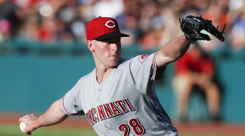 CLEVELAND, OH - JULY 09: Starting pitcher Anthony DeSciafani #28 of the Cincinnati Reds pitches against the Cleveland Indians during the first inning at Progressive Field on July 9, 2018 in Cleveland, Ohio. (Photo by Ron Schwane/Getty Images)