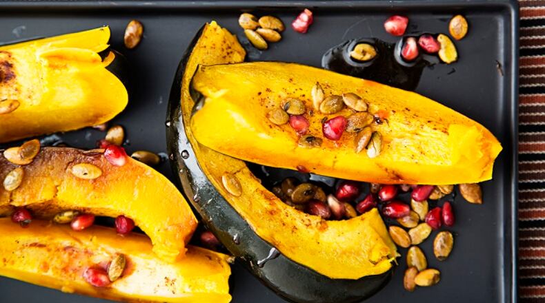 Roasted Acorn Squash With Pumpkin Seeds and Pomegranate