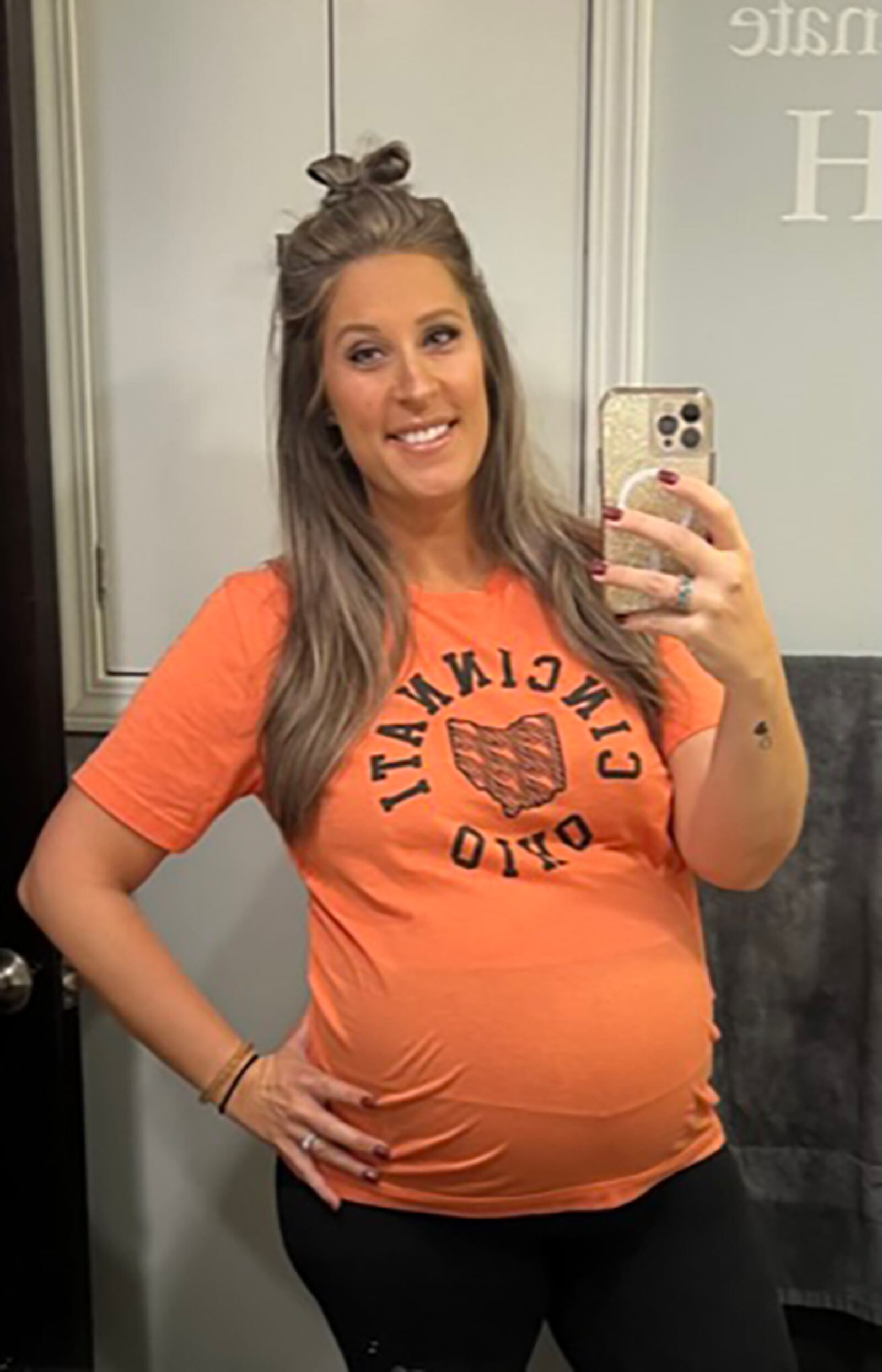 Emily Westerfield is seen before giving birth to her sixth surrogate child in December 2022. She is now pregnant with her seventh surrogate baby, due the summer of 2024.