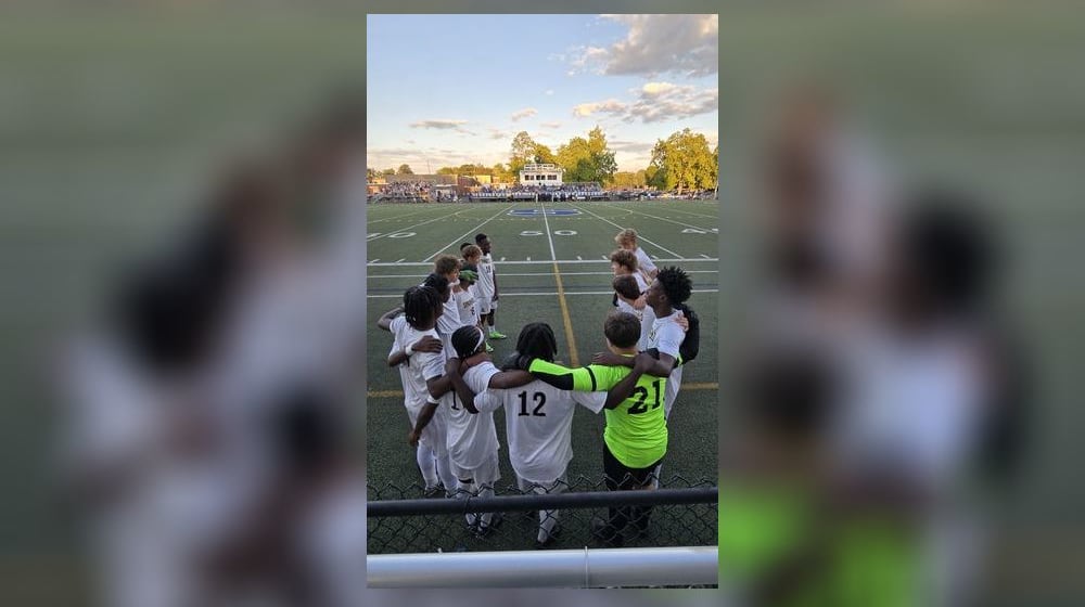 The Springfield High School boys soccer team stands together arm-in-arm before their game on Aug. 26, 2025 at Springboro. CONTRIBUTED PHOTO