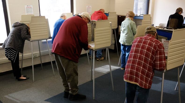 Clark County residents filled all the voting booths Wednesday, Nov. 2, 2022 as they vote early at the Clark County Board of Elections. BILL LACKEY/STAFF