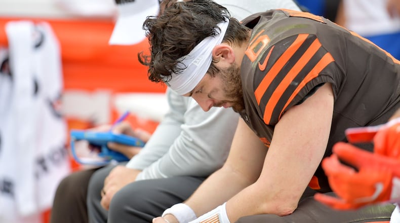 CLEVELAND, OHIO - SEPTEMBER 08: Quarterback Baker Mayfield #6 of the Cleveland Browns hangs his head while on the bench during the second half against the Tennessee Titans at FirstEnergy Stadium on September 08, 2019 in Cleveland, Ohio. The Titans defeated the Browns 43-13. (Photo by Jason Miller/Getty Images)