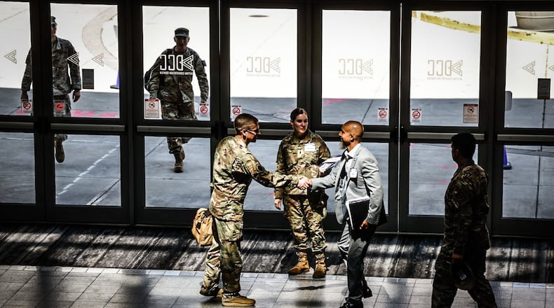 Airmen meet and greet people from the defense industry who attended Life Cycle Industry Days at the Dayton Convention Center in 2024. FILE
