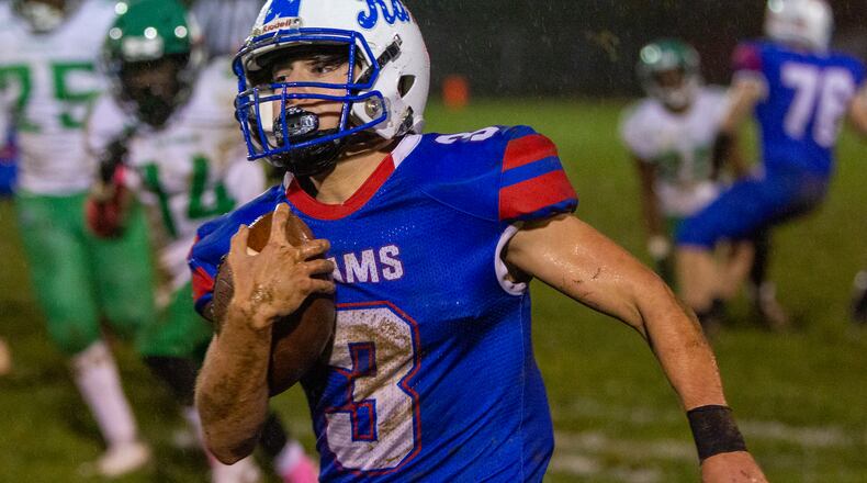 Greeneview quarterback Cole DeHaven runs for a big gain Saturday night during the Rams' 47-0 victory over Cincinnati Gamble Montessori in the Division VI Region 24 playoffs. Jeff Gilbert/CONTRIBUTED