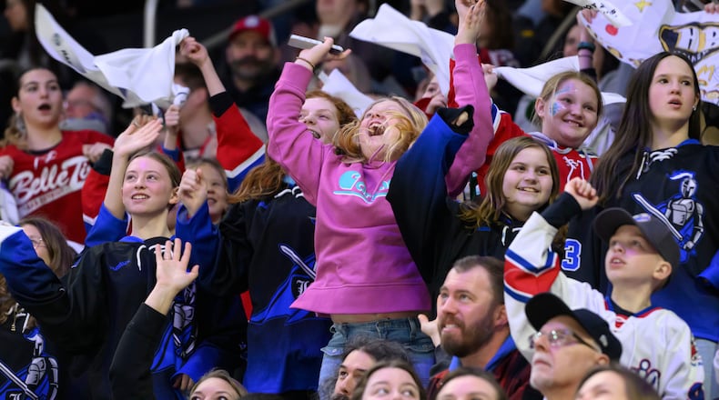 FILE -Fans get excited during the first period of a PWHL game between the New York Sirens and the Minnesota Frost, at Little Caesars Arena, in Detroit, Sunday, March 16, 2025. (David Guralnick/Detroit News via AP, File)