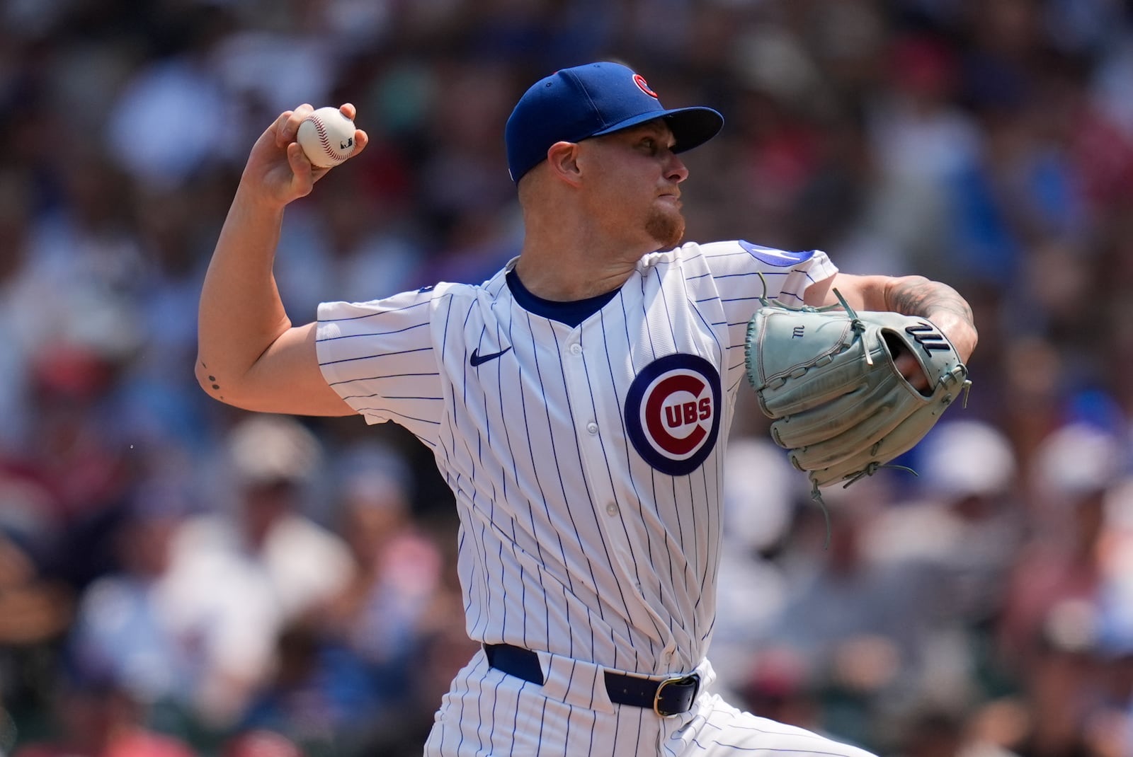 Chicago Cubs starting pitcher Cade Horton (22) throws against the Cincinnati Reds during the first inning of a baseball game Wednesday, Aug. 6, 2025, in Chicago. (AP Photo/Erin Hooley)