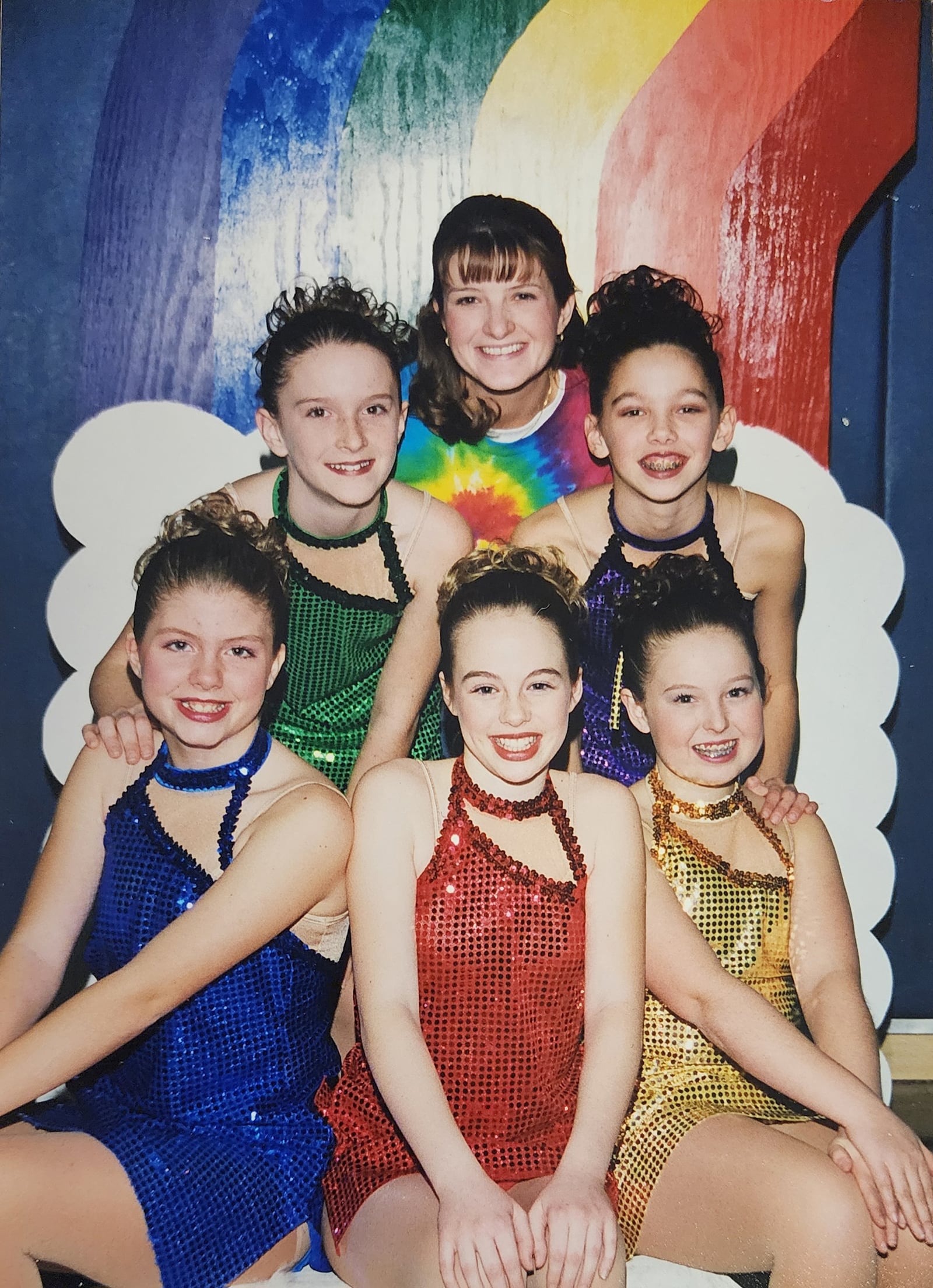 Katie Grothaus (rear) loved coaching and teaching, even in high school. She is shown with the officers line for the 1999 Beavercreek Creekettes. She coached and directed this group for 8 years. CONTRIBUTED