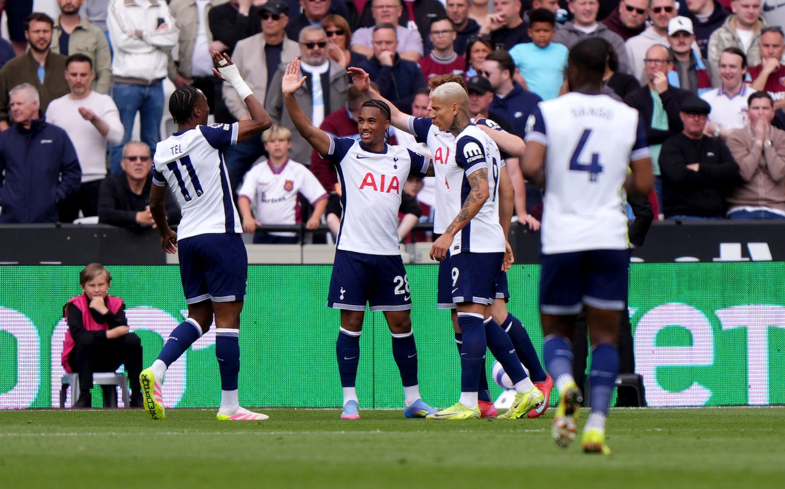 Tottenham Hotspur's Wilson Odobert celebrates scoring his side's first goal of the game, during the English Premier League soccer match between West Ham United and Tottenham Hotspur, at the London Stadium, in London, Sunday May 4, 2025. (Bradley Collyer/PA via AP)
