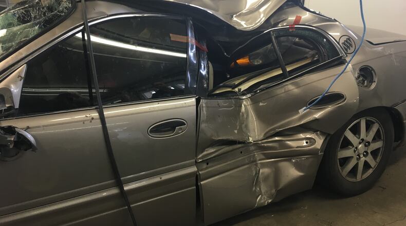 The driver of a Buick Century fled while an Ohio State Highway Patrolman tried to make a traffic stop on Wednesday, April 18, 2018, and crashed into a home in Springfield.