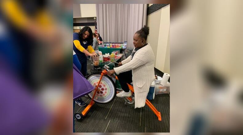 Visitors can create their own smoothie drink by exercising on the smoothie bike during Community Health Foundation's Health Expo '24 on Wednesday, Oct. 9 at the Hollenbeck Bayley Conference Center. The admission-free event will include more than 50 exhibitors offering information on health and wellness topics, screenings, live demonstrations and more. CONTRIBUTED