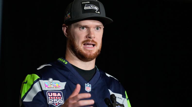 Seattle Seahawks quarterback Sam Darnold (14) speaks during a news conference on Thursday, Feb. 5, 2026, in San Jose, Calif., ahead of Super Bowl 60 between the New England Patriots and the Seattle Seahawks. (AP Photo/Brynn Anderson)