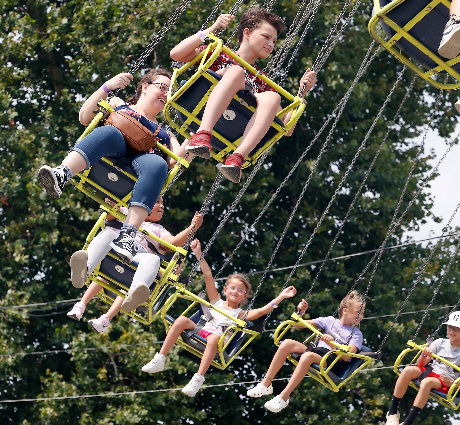 Fairgoers enjoy the rides on the midway at the Clark County Fair Wednesday, July 24, 2024. BILL LACKEY/STAFF
