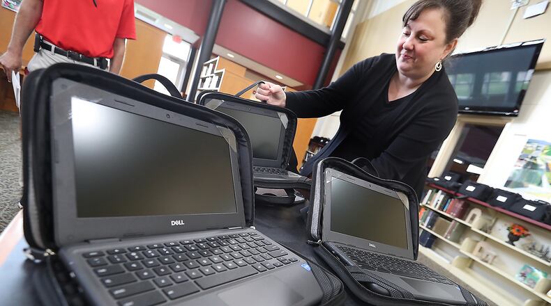 Tecumseh Local School District spent some of their COVID relief funds on hundreds of Chromebooks. BILL LACKEY/STAFF
