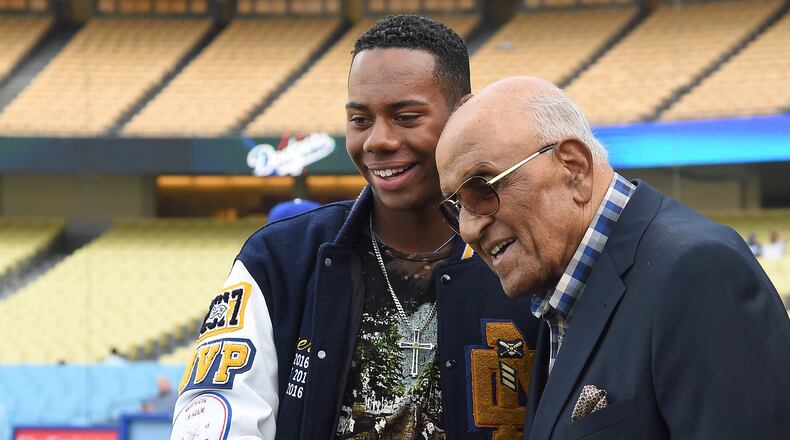 Hunter Greene meets Hall of Famer Don Newcombe during batting practice before a game against the Philadelphia Phillies at Dodger Stadium on April 28, 2017 in Los Angeles, California. (Photo by Jayne Kamin-Oncea/Getty Images)