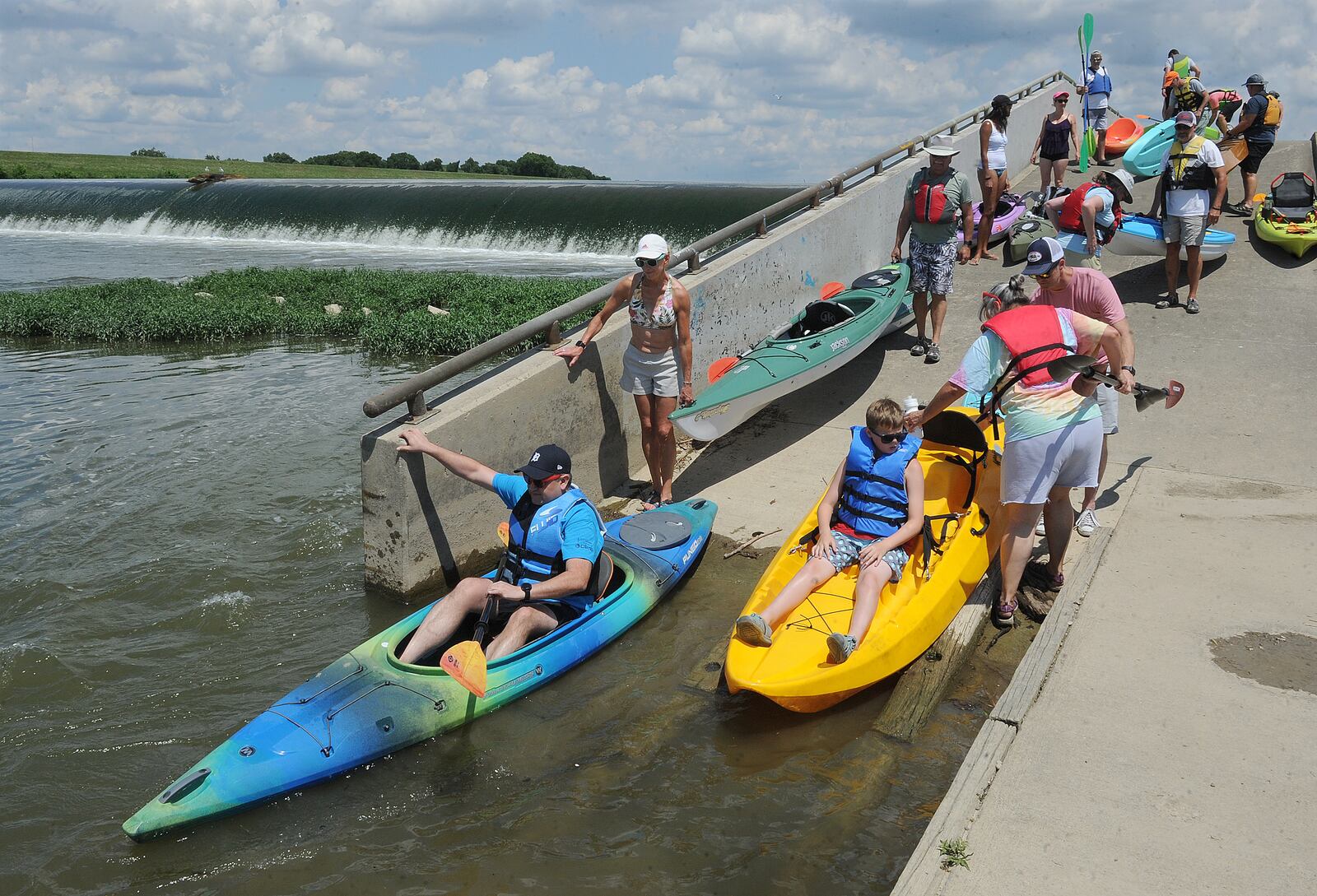 More than 100 paddlers signed up to canoe and kayak down the Great Miami River on Thursday, July 14, 2022 as part of the Great Float event. The 5-mile float started at Miami Bend Park in West Carrollton and led paddlers to Case Landing in Miamisburg. The float, sponsored by the Great Miami Riverway organization, also highlighted some areas where riverfront development is starting to take shape. MARSHALL GORBY\STAFF