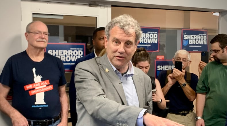 U.S. Sen. Sherrod Brown, D-Ohio, speaks to volunteers during a canvassing event Sunday afternoon in Dayton. LONDON BISHOP/STAFF