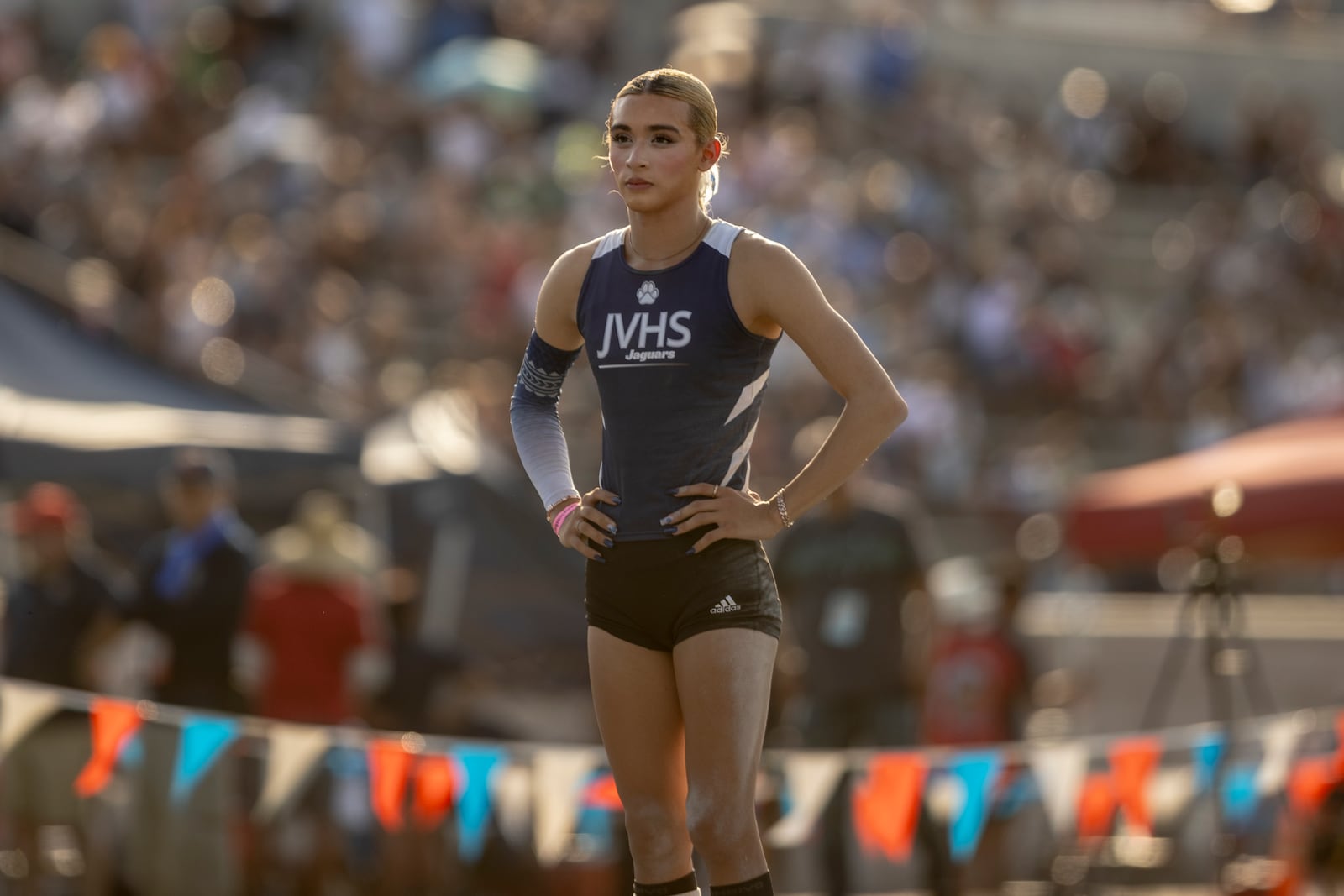 AB Hernandez, a transgender student at Jurupa Valley High School, is seen while competing in the high jump at the California high school track-and-field championships in Clovis, Calif., Saturday, May 31, 2025(Stephen Lam/San Francisco Chronicle via AP)
