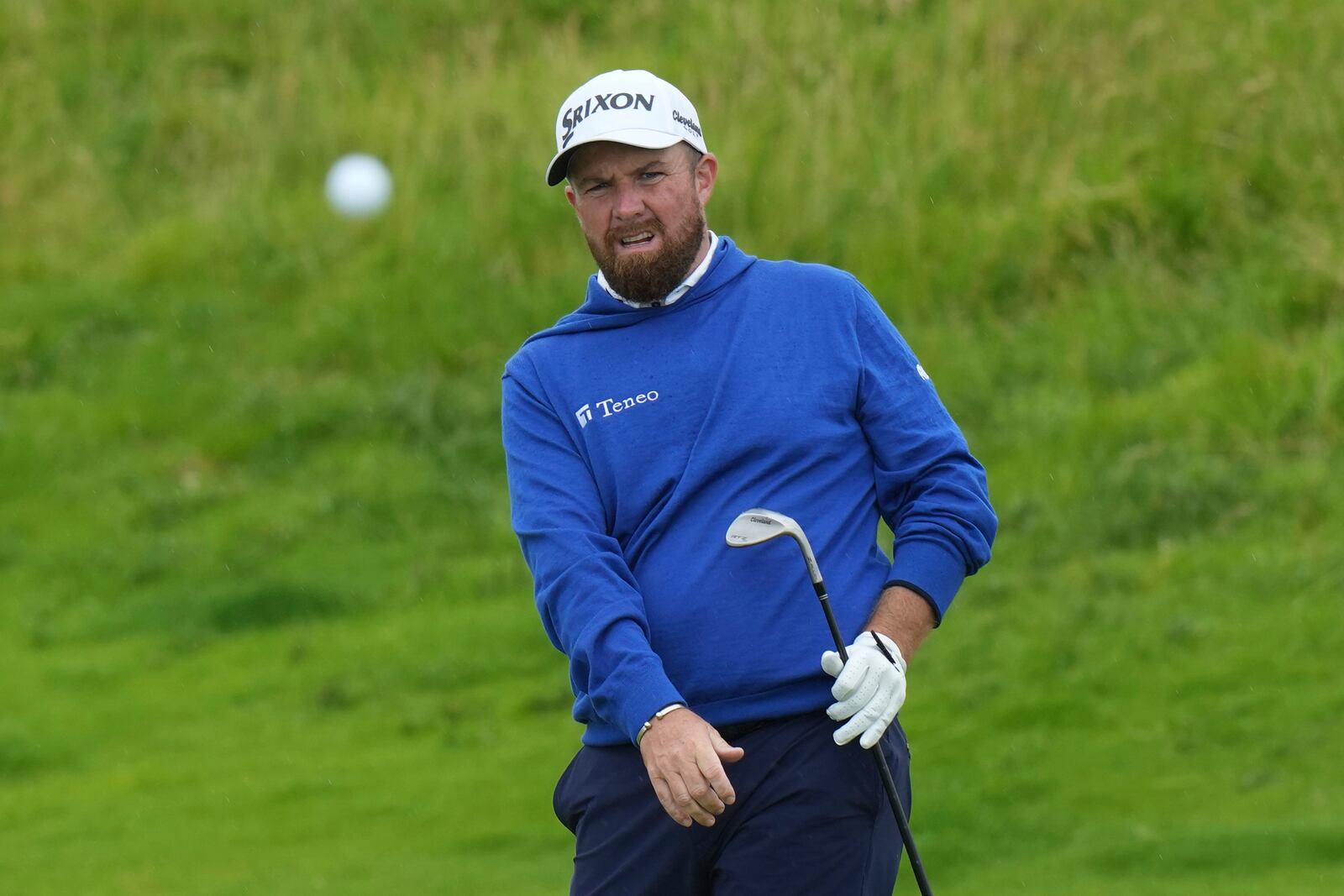 Shane Lowry of Ireland watches the flight of his ball on the 16th hole during a practice round for the British Open golf championship at the Royal Portrush Golf Club, Northern Ireland, Tuesday, July 15, 2025. (AP Photo/Francisco Seco)