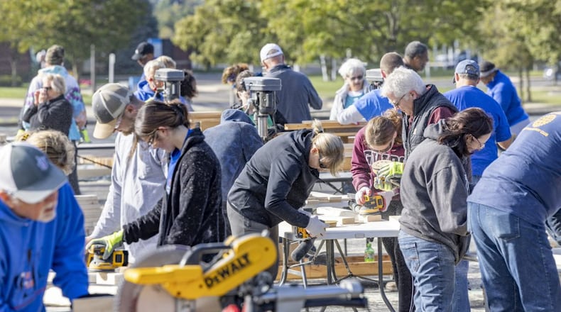 A file photo of Atrium Medical Center employees and the Rotary Club of Middletown hosting a bed build on Oct. 1, 2022 for Sleep in Heavenly Peace’s Butler County chapter, a local nonprofit organization that builds and delivers beds to children who do not have one. A chapter in Clark County will be opening in January 2026. CONTRIBUTED