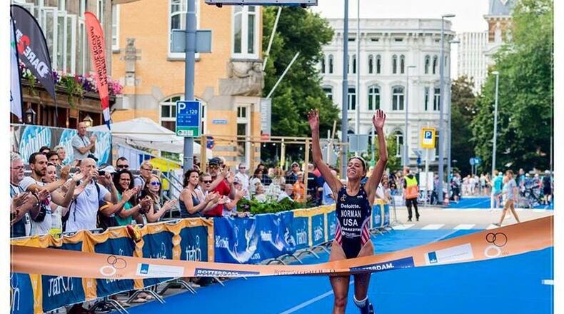 Grace Norman crosses the finish line first in Rotterdam at the World Championships. Contributed photo