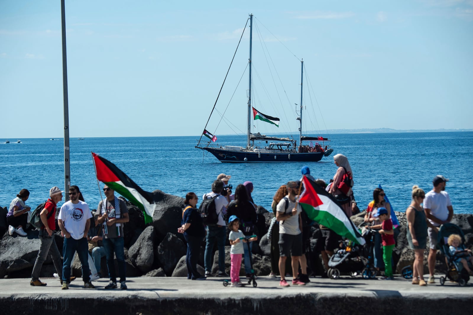 The Freedom Flotilla human rights organization Madleen boat is docked near Catania's harbor, Italy, Sunday, June 1, 2025, ahead of its departure for the Mideast. (AP Photo/Salvatore Cavalli)