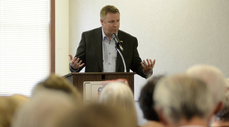 U.S. Rep. Warren Davidson, R-Troy, speaks to constituents on Wednesday afternoon, April 19, 2017, in Oxford. He addressed a variety of topics, including immigration, to the crowd of about 75 people. MICHAEL D. PITMAN/STAFF