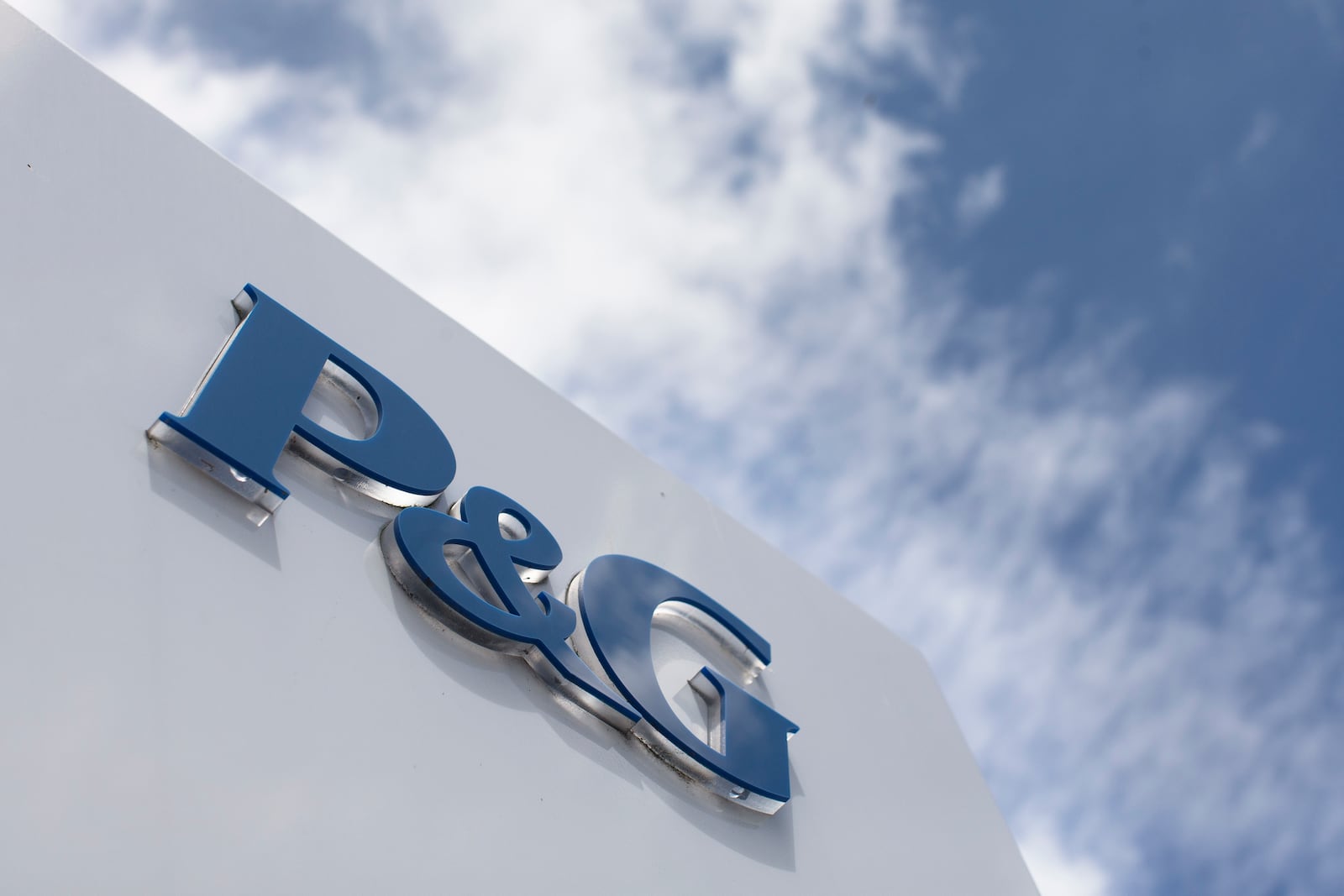 FILE - This July 9, 2015, file photo, shows signage outside Procter & Gamble corporate headquarters in downtown Cincinnati. (AP Photo/John Minchillo, File)