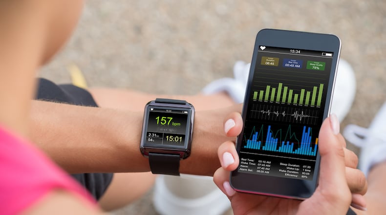 There were 850 million fitness app downloads last year, evidence of a significant shift toward greater ease of access and convenience in fitness. iSTOCK/COX
