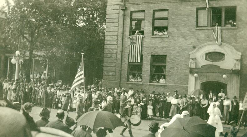 On May 21, 1918 the city of Springfield held a War Chest parade through downtown to encourage patriotism and emotional and financial support of the war. This photo shows the parade passing in front of the Elks Lodge at 126 W. High Street. Springfield Lodge No. 51, started on August 30, 1886, had opened the lodge in 1909. 100 years later, the Elks sold their lodge and moved to Northwood Hills Country Club and the building has found new life at the Buckeye Sports Lodge. PHOTO COURTESY OF THE CLARK COUNTY HISTORICAL SOCIETY