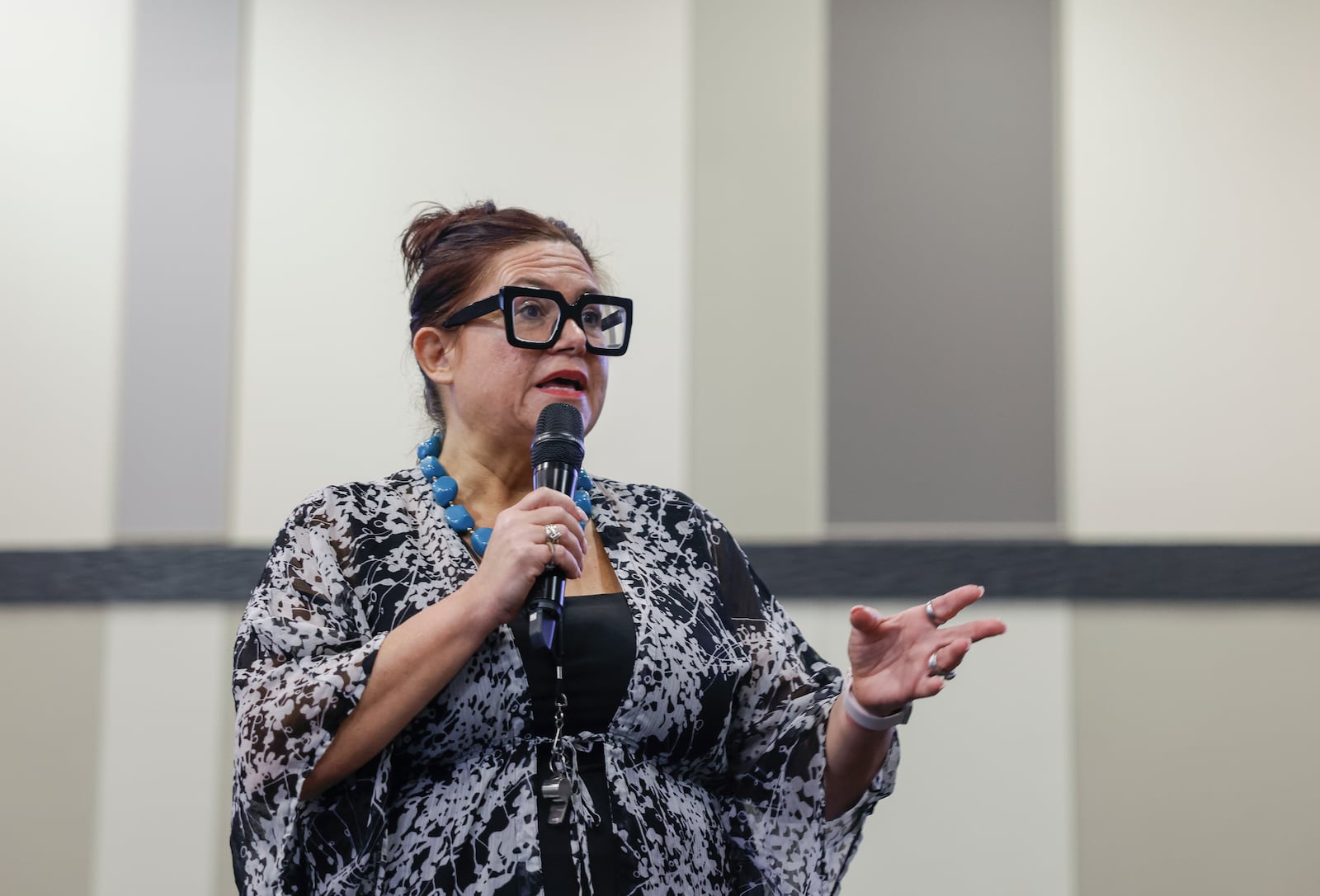Andrea Carter, lead COPE facilitator of Think Tank, Inc., speaks to actors participating in a reentry simulation for National Reentry Month held by the Department of Reentry on Tuesday, April 29, 2025, at the Hollenbeck Bayley Center. JOSEPH COOKE/STAFF