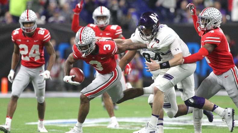 Ohio State’s Damon Arnette returns an interception against Northwestern in the Big Ten Championship on Saturday, Dec. 1, 2018, at Lucas Oil Stadium in Indianapolis. David Jablonski/Staff