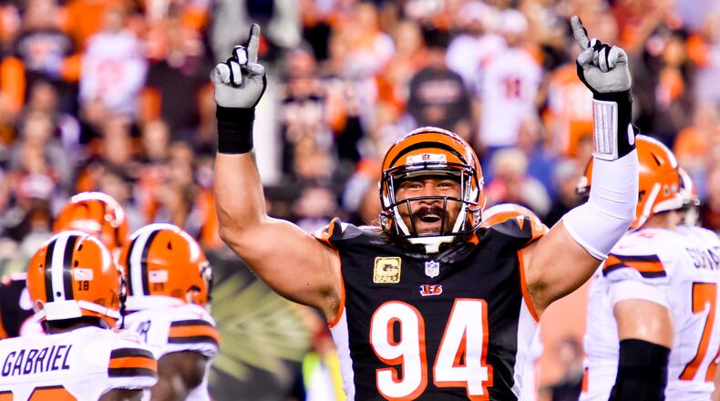 Cincinnati Bengals defensive tackle Domata Peko gets the fans pumped up after making a tackle during their 31-10 win over the Cleveland Browns Thursday, Nov. 5 at Paul Brown Stadium in Cincinnati. The Bengals are now 8-0 on the season. NICK GRAHAM/STAFF