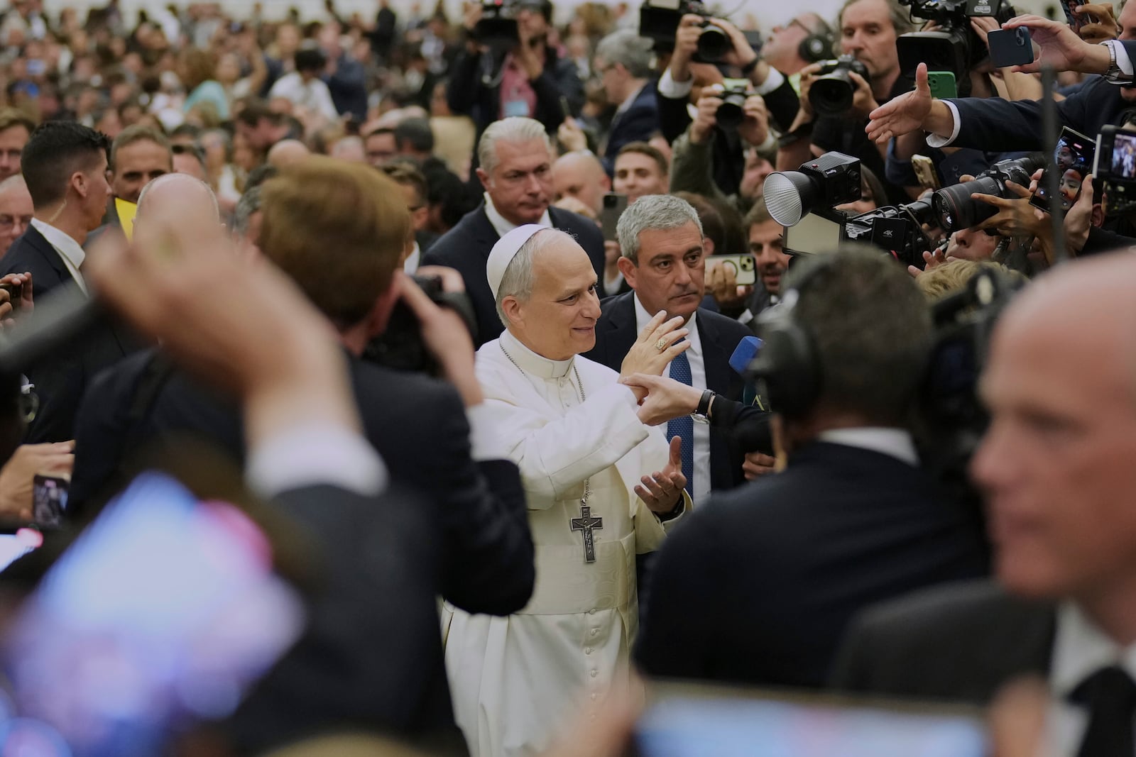 Pope Leo XIV meets members of the international media in the Paul VI Hall at the Vatican, Monday, May 12, 2025. (AP Photo/Andrew Medichini)
