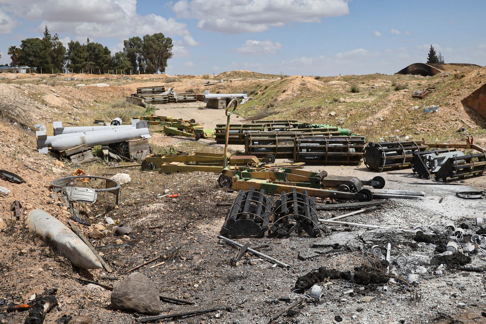 Debris is scattered at the site of an Israeli strike on a military airbase near Hama, Syria, Thursday, April 3, 2025. (AP Photo)