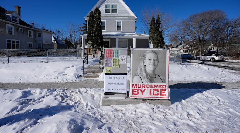 A photo of Renee Good is displayed in front of a home on Saturday, Jan. 31, 2026, in Minneapolis. (AP Photo/Alex Brandon)