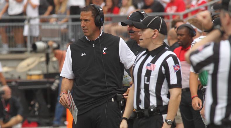 Cincinnati coach Luke Fickell walks the sideline during a game against Ohio State on Saturday, Sept. 7, 2019, at Ohio Stadium in Columbus. David Jablonski/Staff