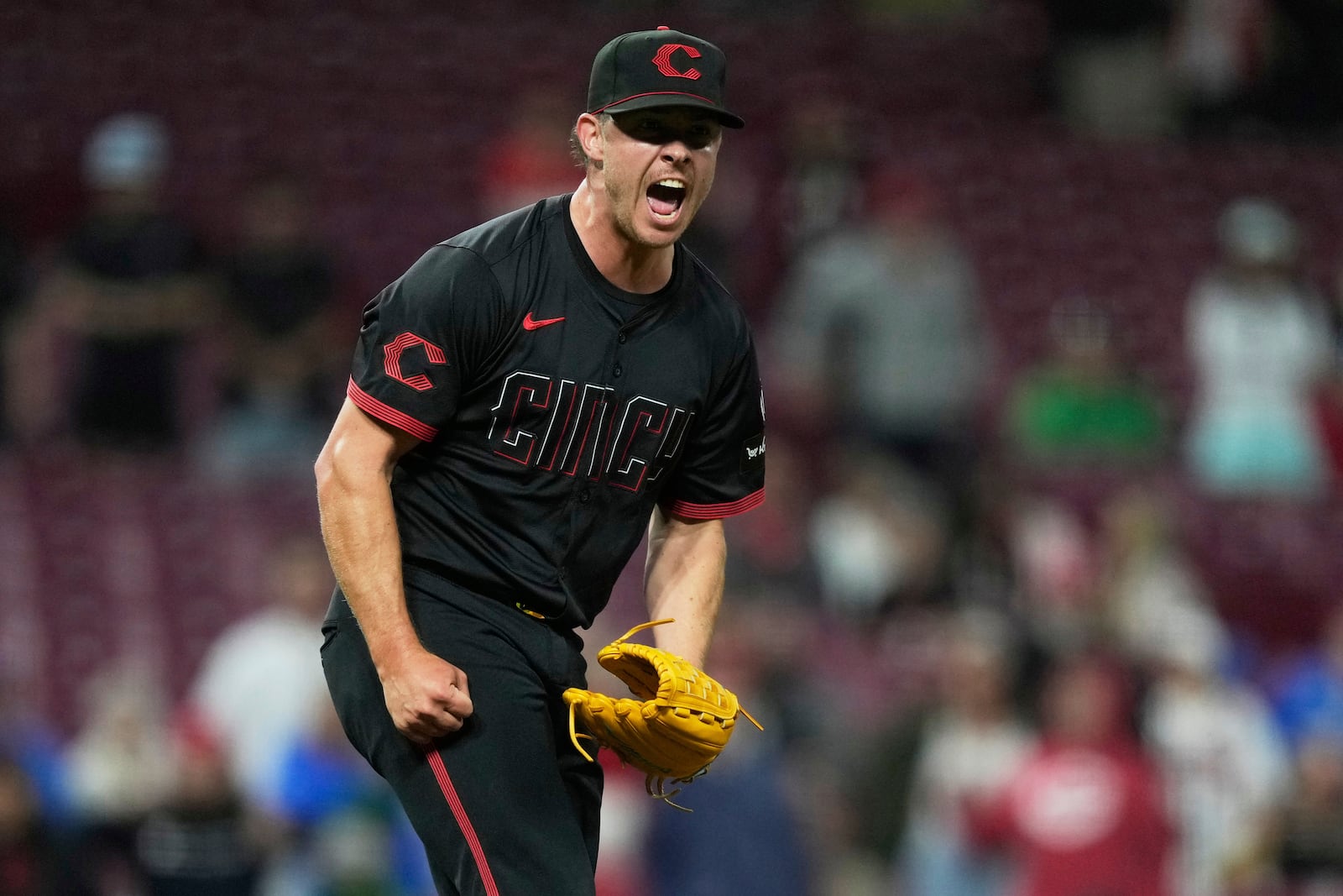 Cincinnati Reds pitcher Emilio Pagán reacts after striking out Washington Nationals' Dylan Crews for the final out of a baseball game, Friday, May 2, 2025, in Cincinnati. (AP Photo/Carolyn Kaster)
