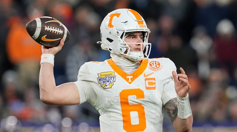 FILE - Tennessee quarterback Joey Aguilar (6) looks to throw a pass during the second half of the Music City Bowl NCAA college football game against Illinois, Dec. 30, 2025, in Nashville, Tenn. (AP Photo/George Walker IV, File)