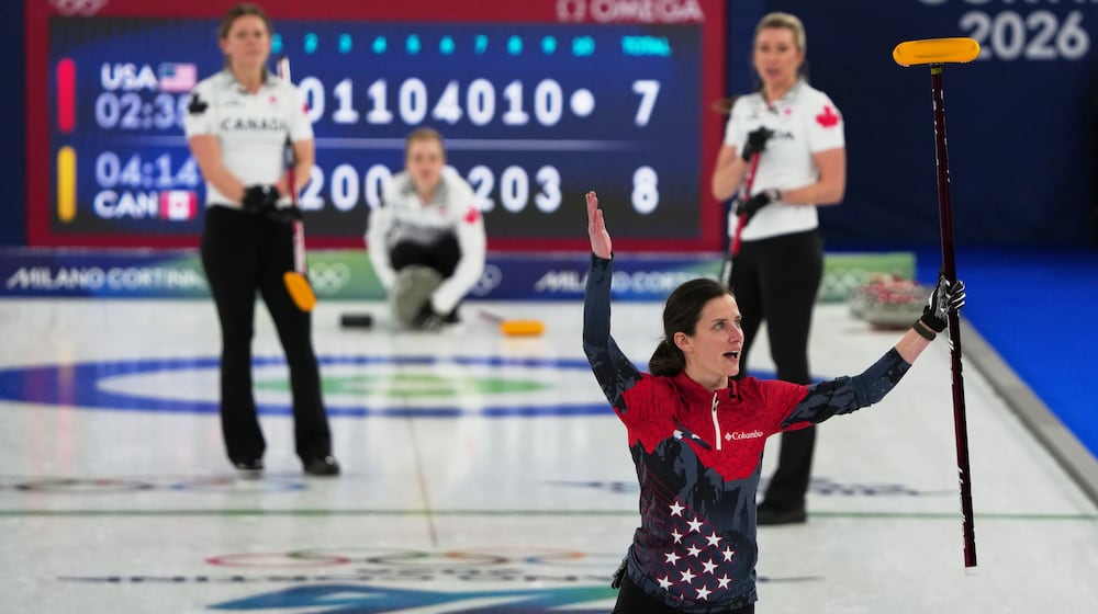 United States' Tara Peterson reacts during the women's curling round robin session against Canada, at the 2026 Winter Olympics, in Cortina d'Ampezzo, Italy, Friday, Feb. 13, 2026. (AP Photo/Misper Apawu)