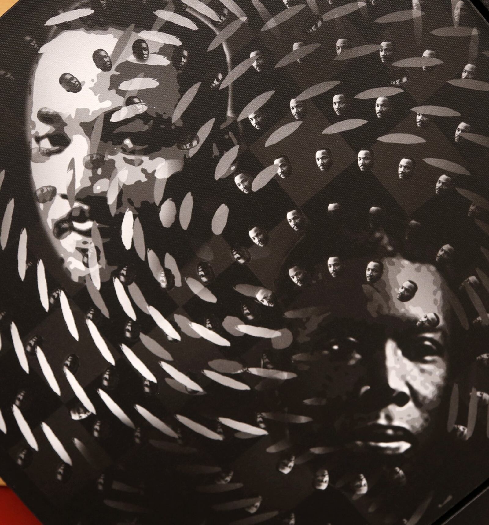 This is a detail from a four panel compostion by Dayton artist Kevin Harris. The artist was inspired by four of Paul Laurence Dunbar’s poems. The artwork is part of the display, “The Preacher, The Poet, The Vision,” on display in the Wintergarden of the Schuster Center. LISA POWELL / STAFF