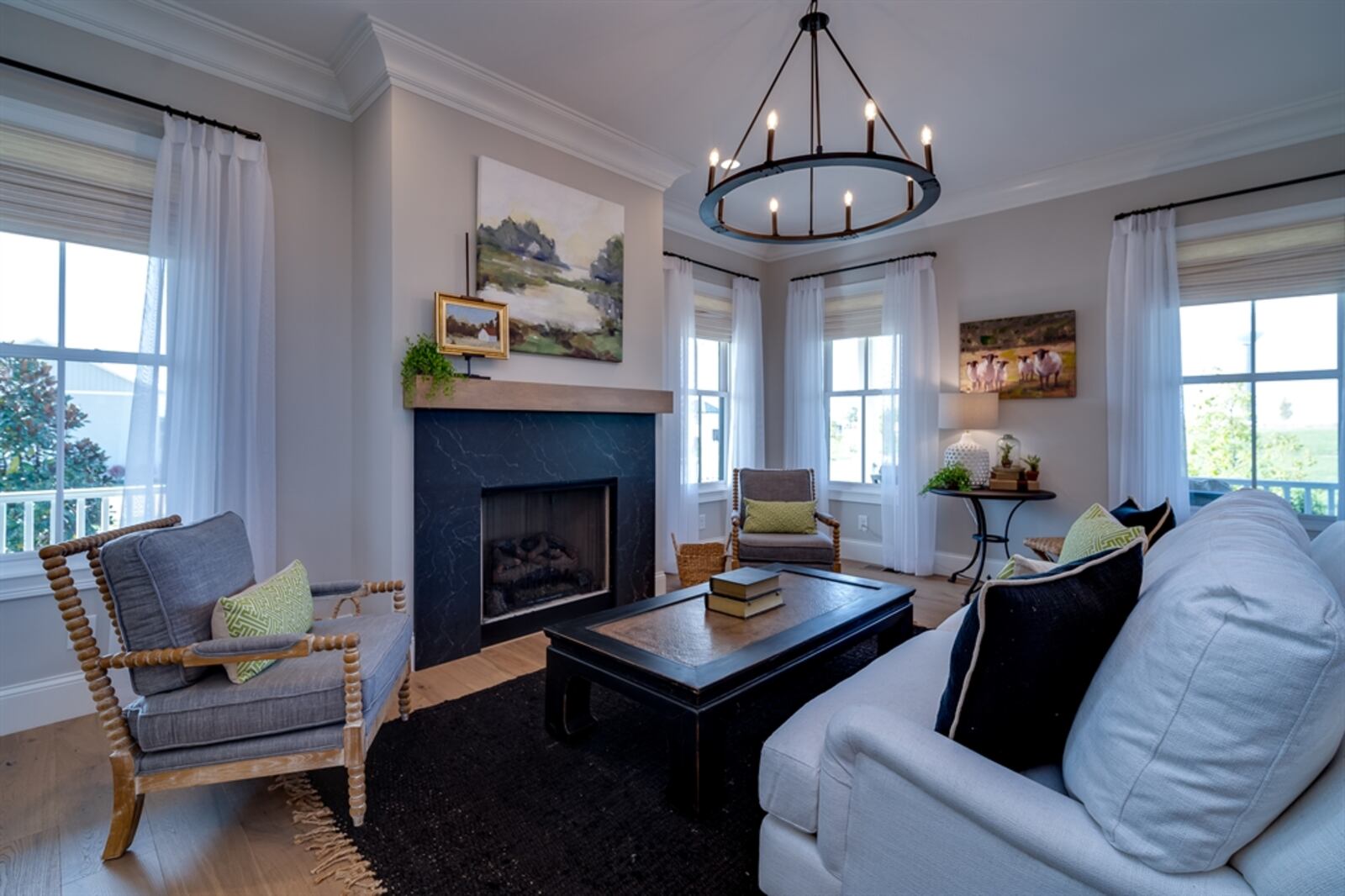 The formal entry opens into the living room with a gas fireplace surrounded by quartz. CONTRIBUTED PHOTO
