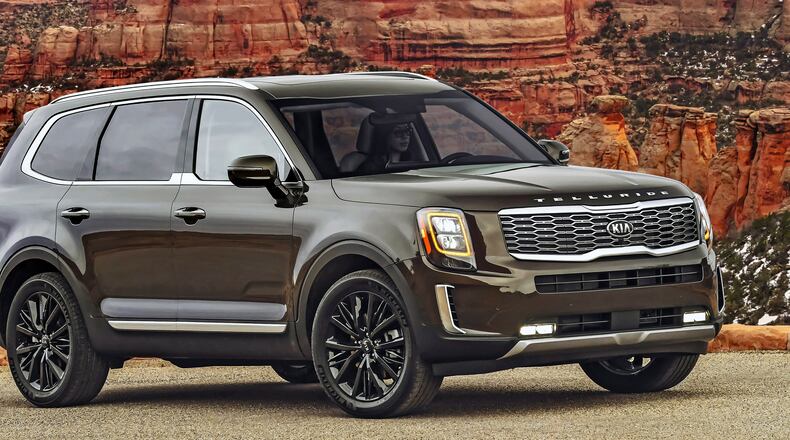 The 2021 Kia Telluride retains its crown as the Best 3-Row SUV for Families. It stands out from the competition with its more premium look and feel. (Greg Jarem/Kia Motors via AP)