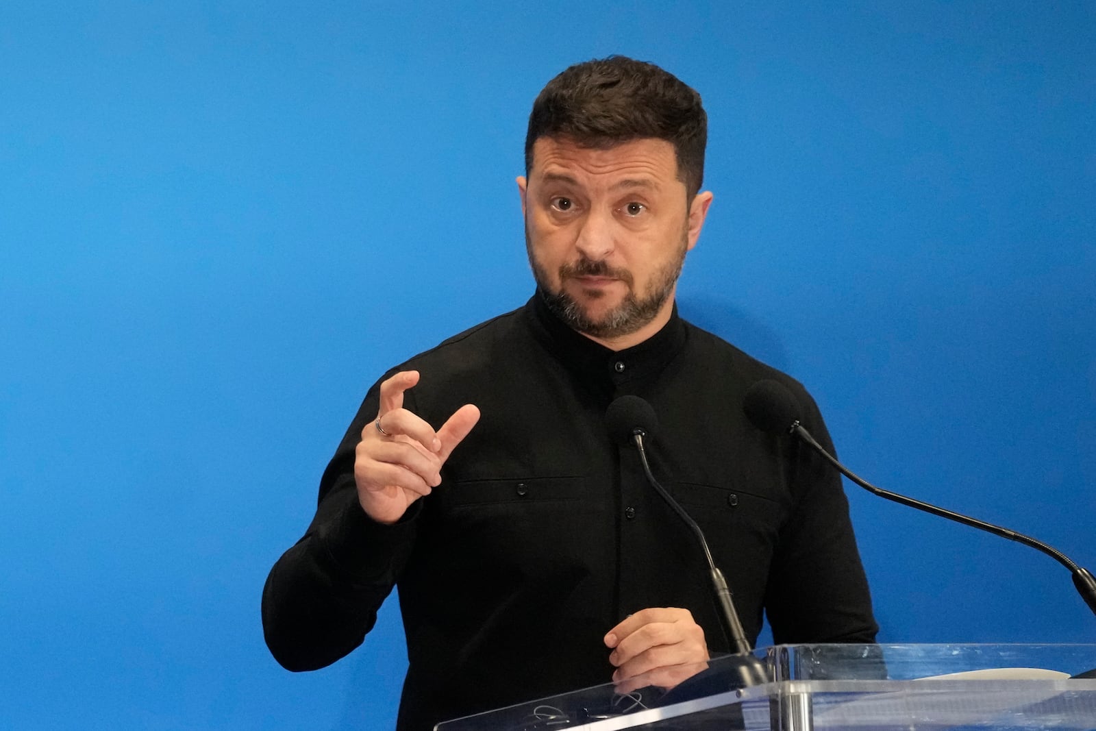 Ukraine's President Volodymyr Zelenskyy speaks with reporters during the Ukraine Recovery Conference at La Nuvola convention center in Rome, Thursday, July 10, 2025. (AP Photo/Gregorio Borgia)
