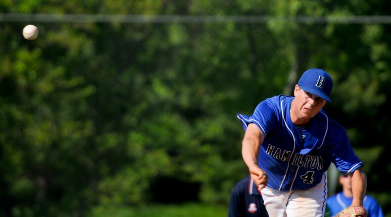 Hamilton’s Patrick McGuff hurls a pitch during their D-I sectional baseball game against Mason Thursday,May 17, 2012 at Lakota West High School. Mason defeated Hamilton 7-0 to advance. Photo by Nick Graham